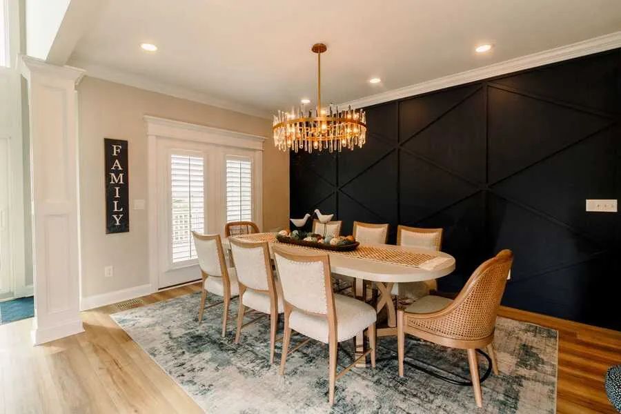 Dining room with black accent wall