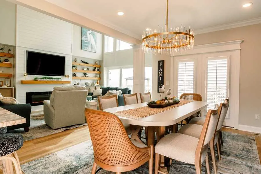 Dining area with chandelier and fireplace