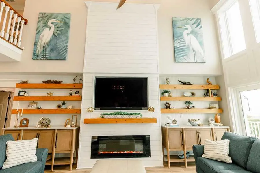 Shiplap fireplace wall with floating shelves