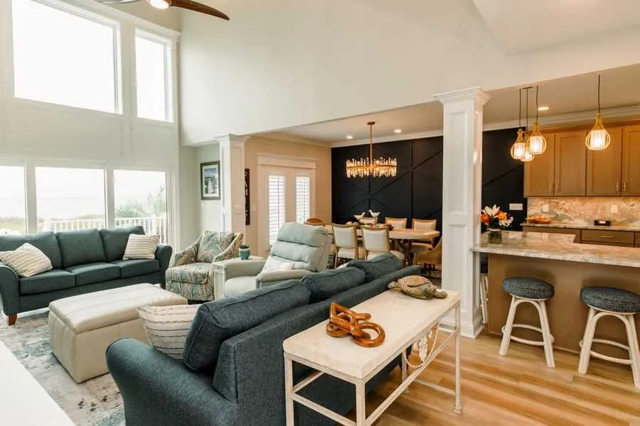 Open great room flowing into a renovated kitchen with island seating