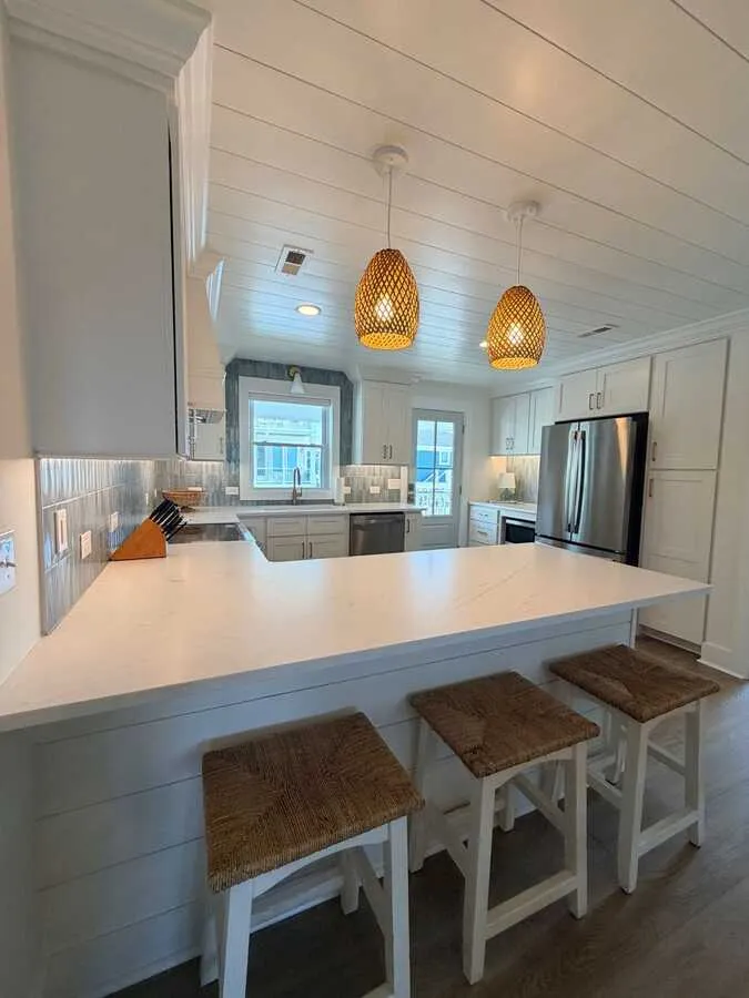 Remodeled kitchen with pendant lighting