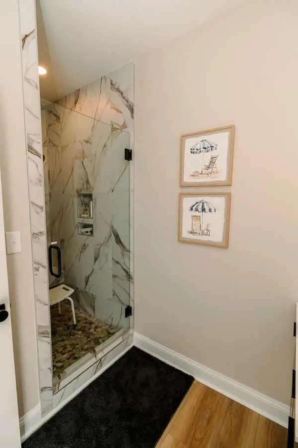 Marble-tiled walk-in shower