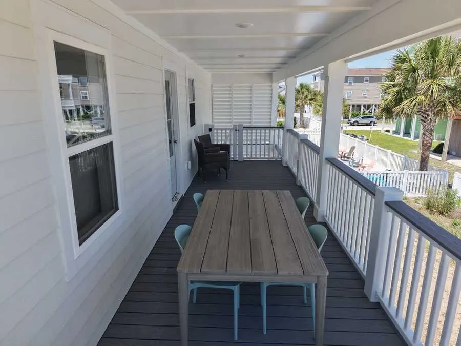 Covered porch with dining table