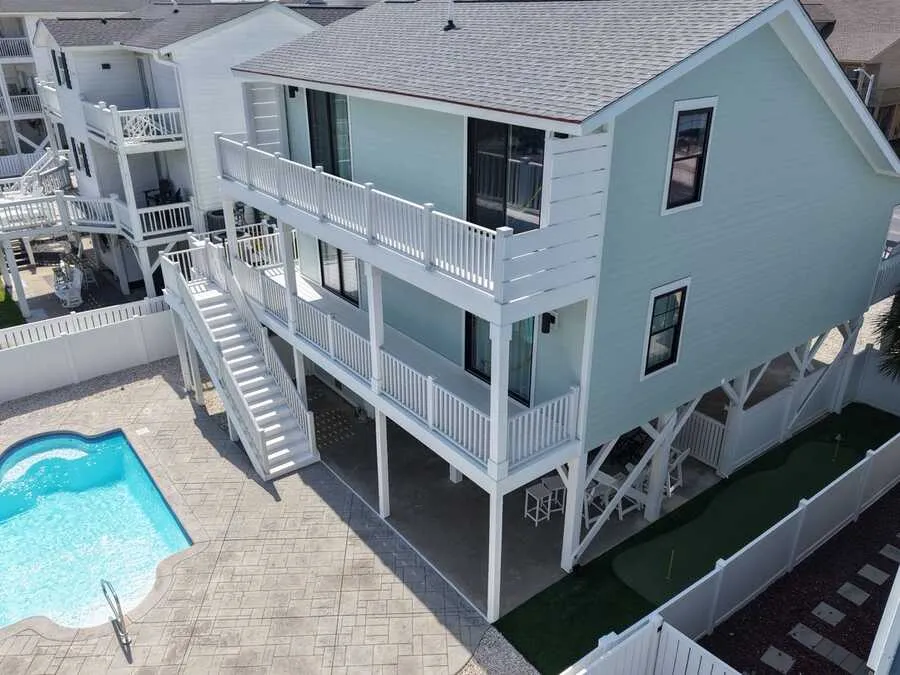Raised beach home with pool and new decks